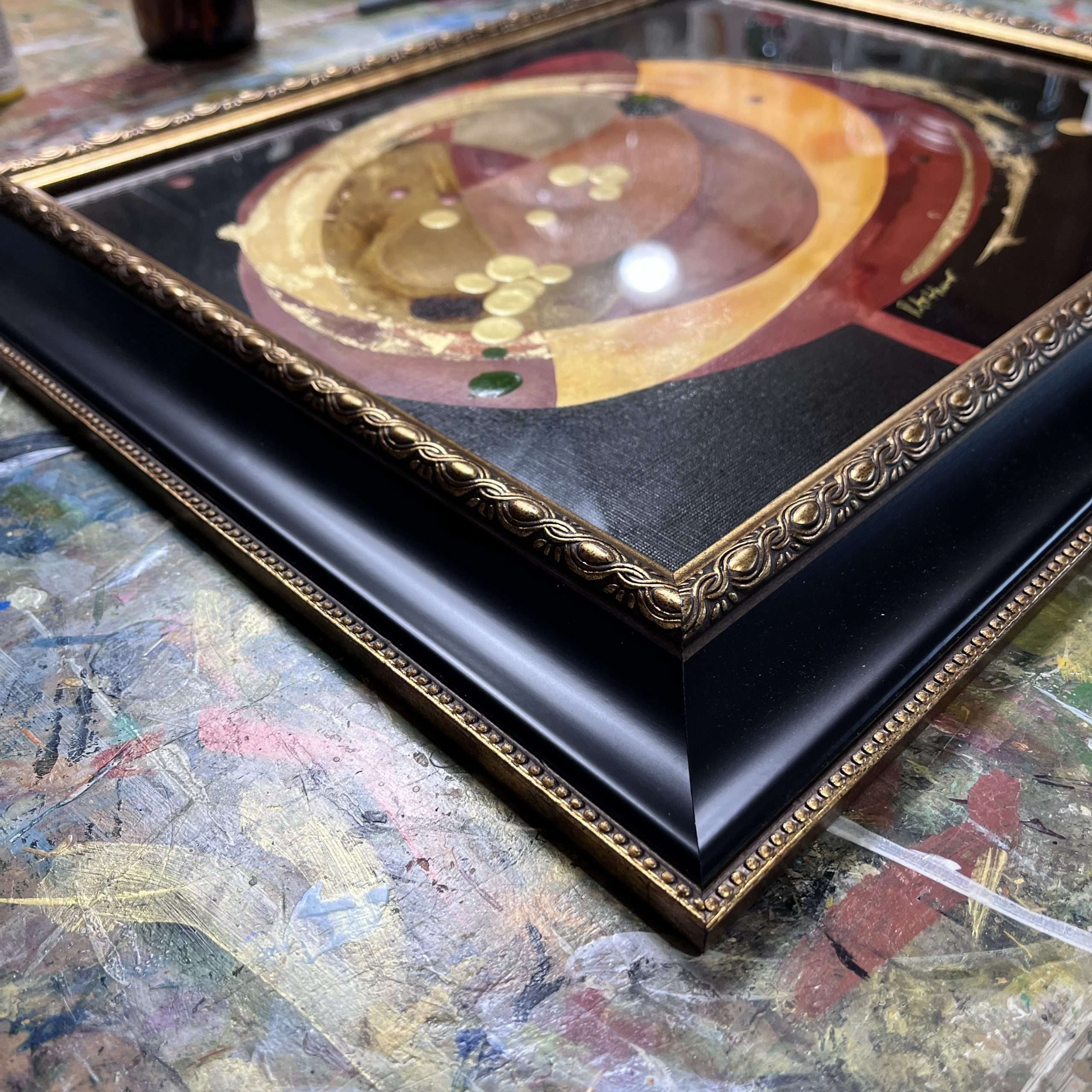 Detail of black, yellow and red abstract painting by Colorado artist Robin Arthur